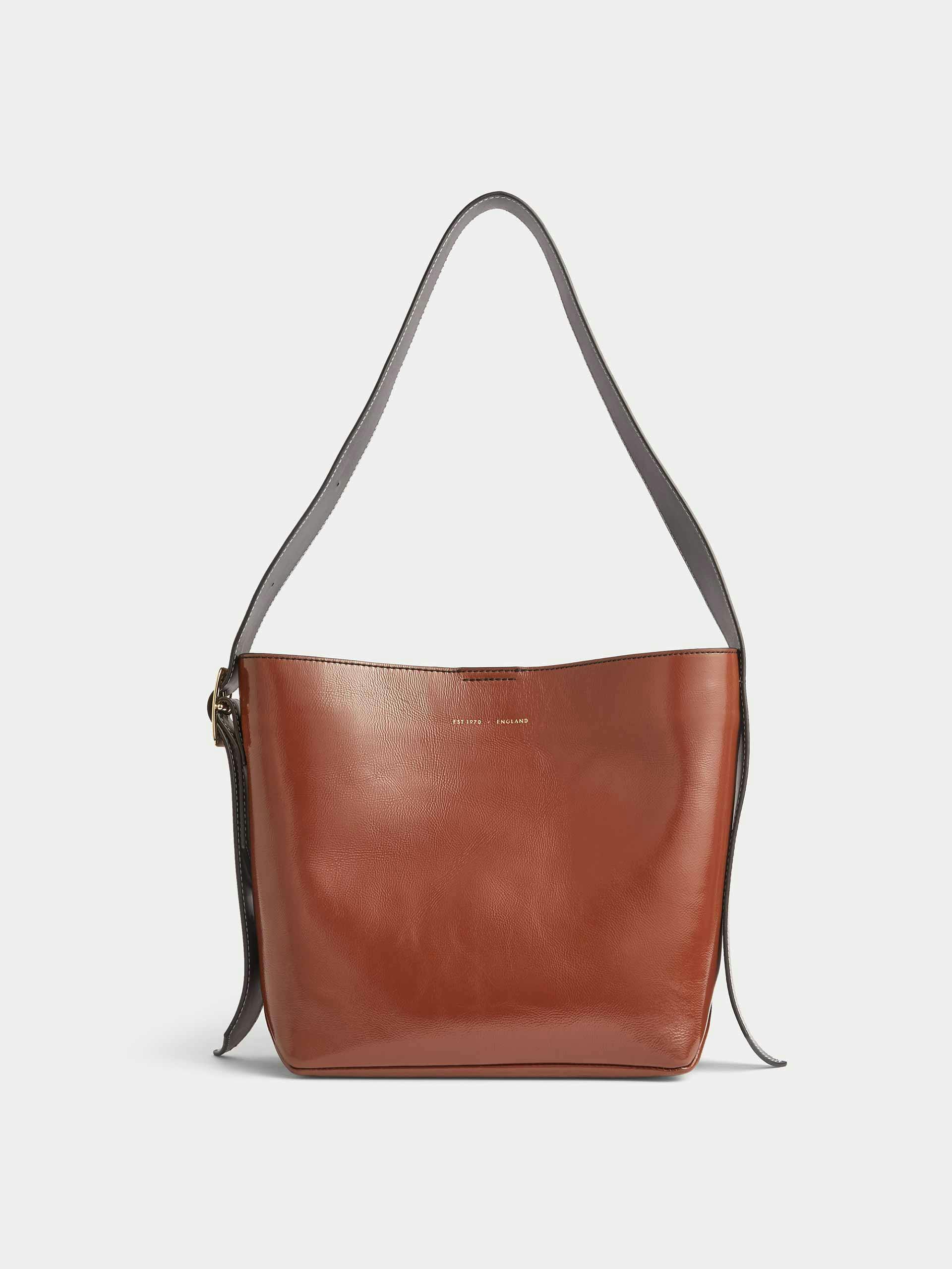 Leather tote bag with statement hardware